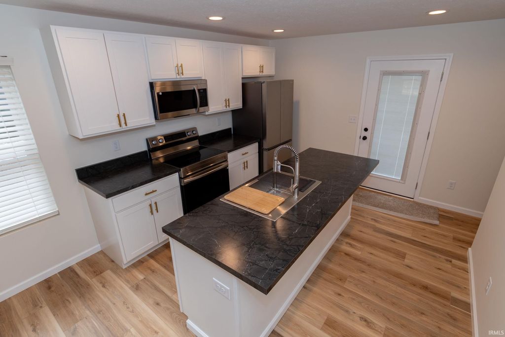 Photo of 1117 Edwardsburg Ave., Elkhart, IN 46514 (MLS # 202601410)