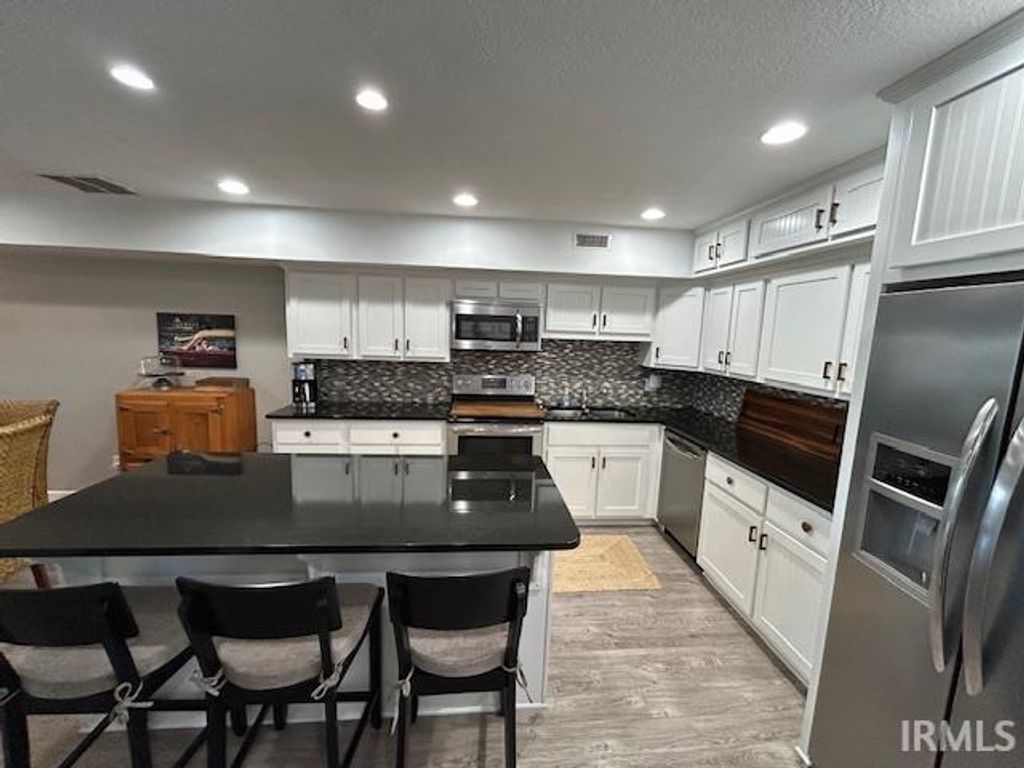 Photo of 12601 N Pleasant Grove Road, Syracuse, IN 46567 (MLS # 202611553)