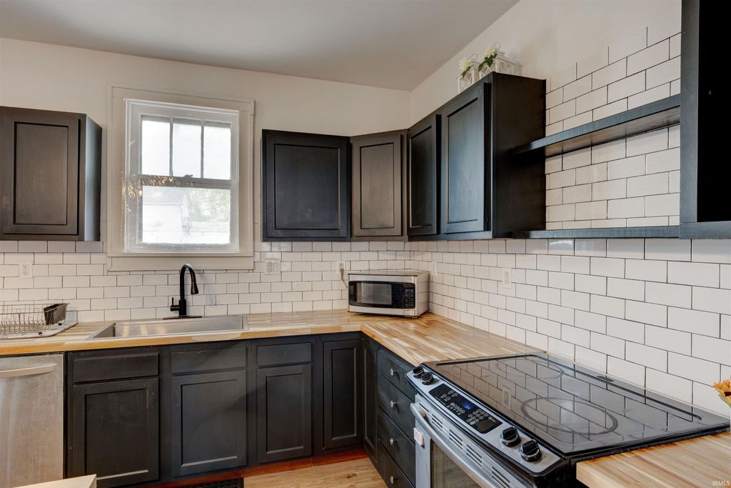 Photo of 509 Taylor Street, Cannelton, IN 47520 (MLS # 202611647)