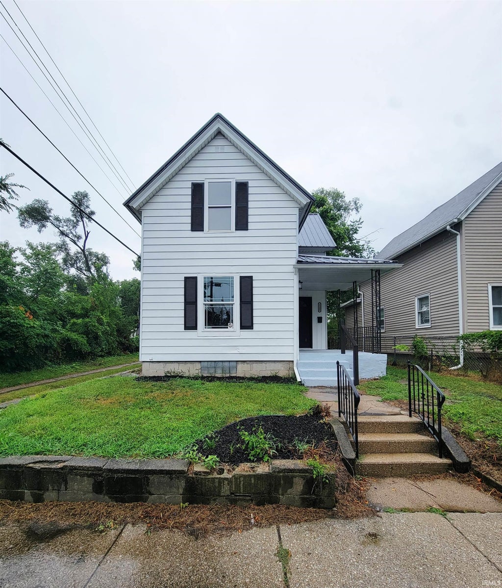 Photo of 1233 Van Buren Street, South Bend, IN 46628 (MLS # 202632154)