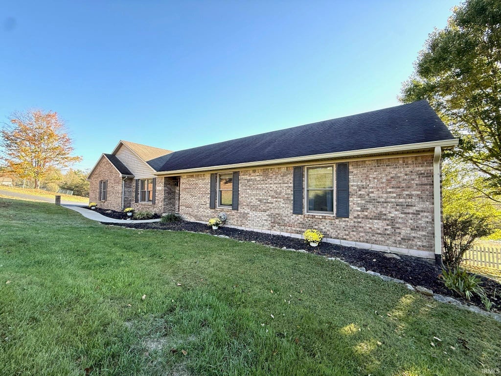 Photo of 516 W 11th Street, Oolitic, IN 47451 (MLS # 202643319)