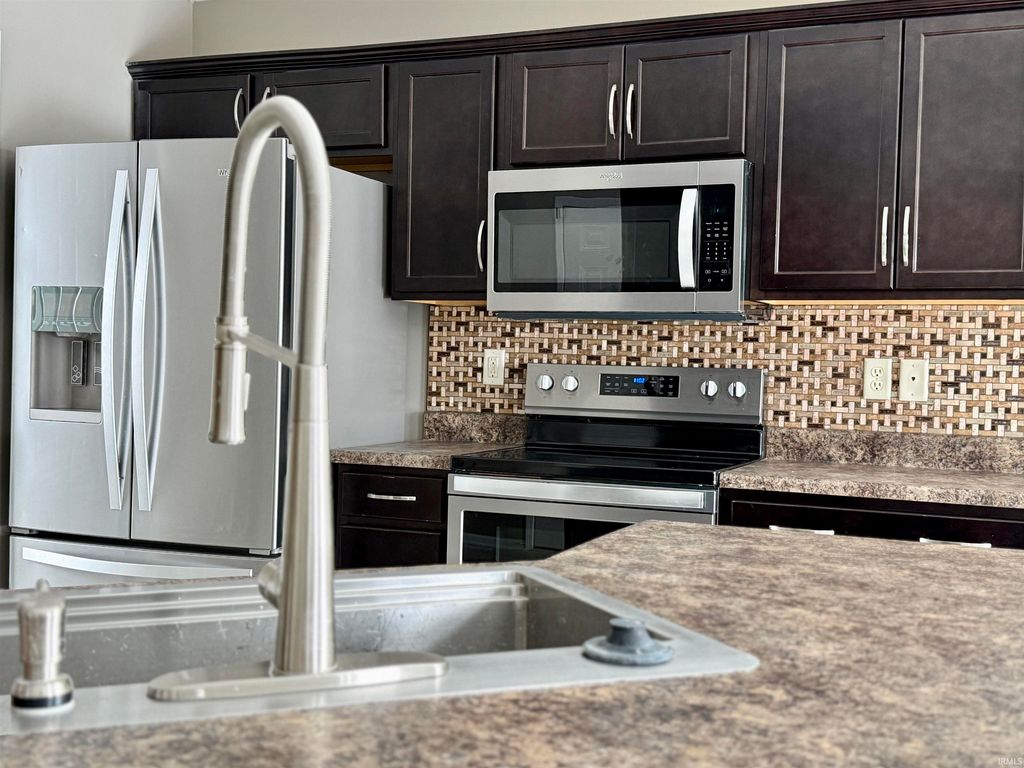 Photo of 14926 Cypress Pointe Drive, Fort Wayne, IN 46818 (MLS # 202602613)