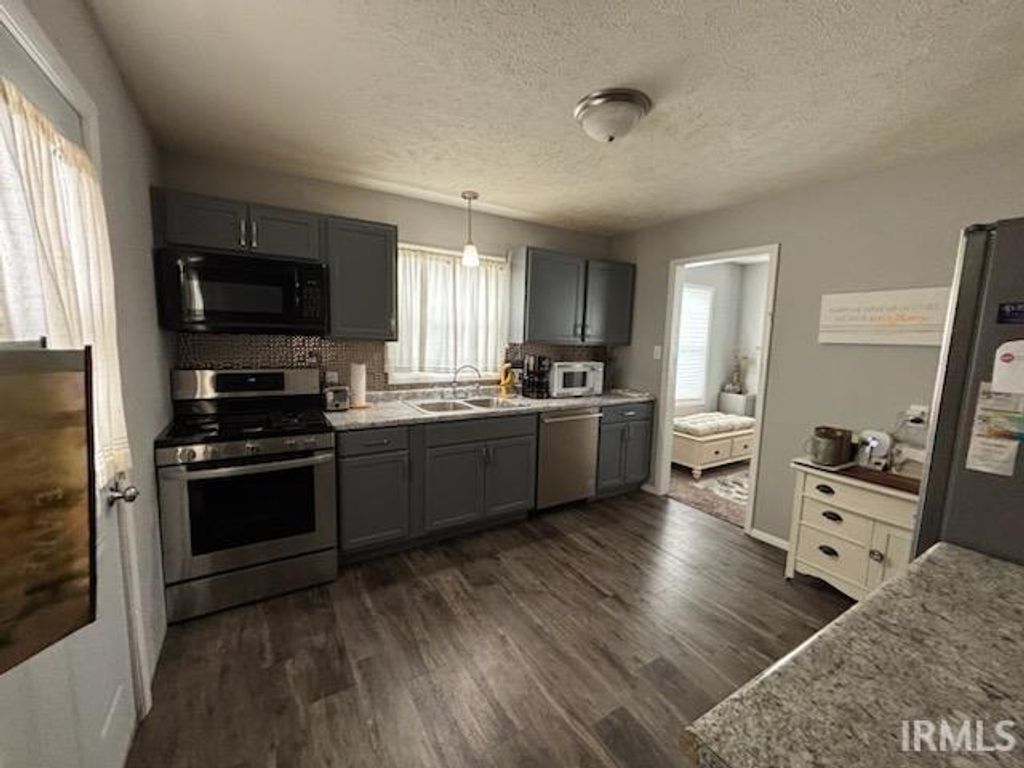 Photo of 1323 Laurel Street, Elkhart, IN 46514 (MLS # 202547847)