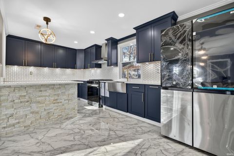 Tiny photo for 514 Henry Street, Logansport, IN 46947 (MLS # 202609330)