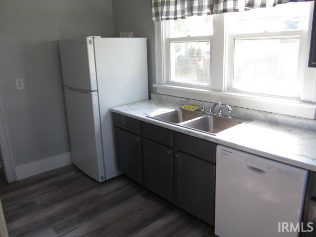 Photo of 210 W Garfield Avenue, Elkhart, IN 46516 (MLS # 202615408)