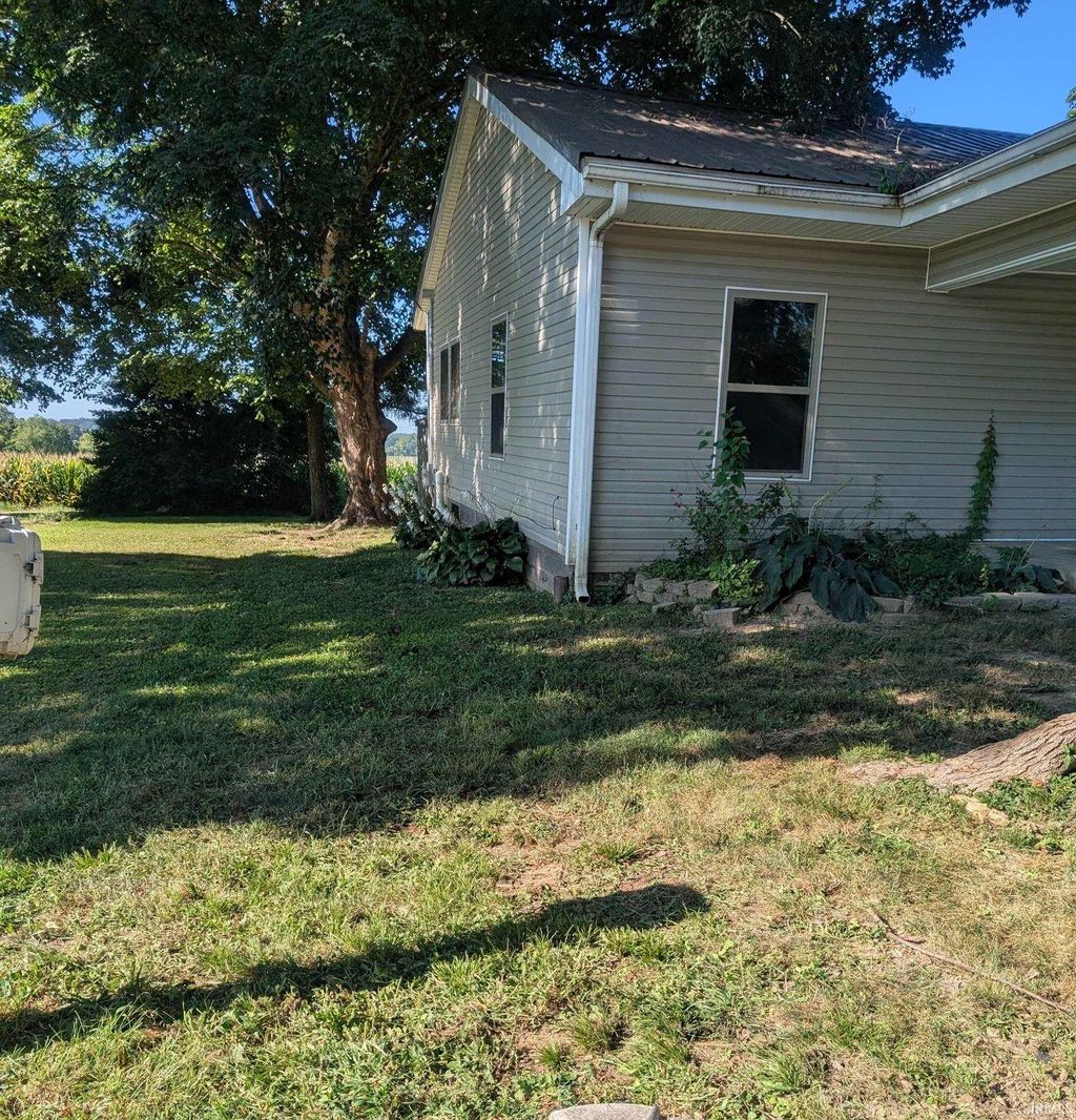 Photo of 609 W Main Street, Bruceville, IN 47516 (MLS # 202536702)