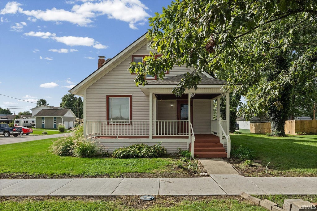 Photo of 309 E Walnut Street, Chalmers, IN 47929 (MLS # 202639471)