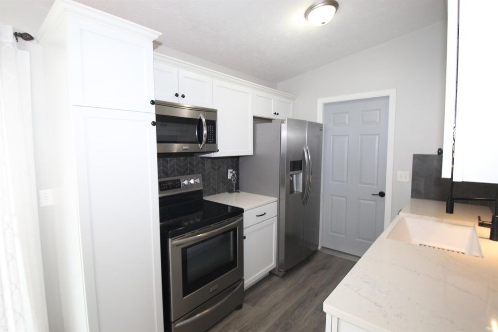 Photo of 1820 Woodland Drive, Elkhart, IN 46514 (MLS # 202611440)