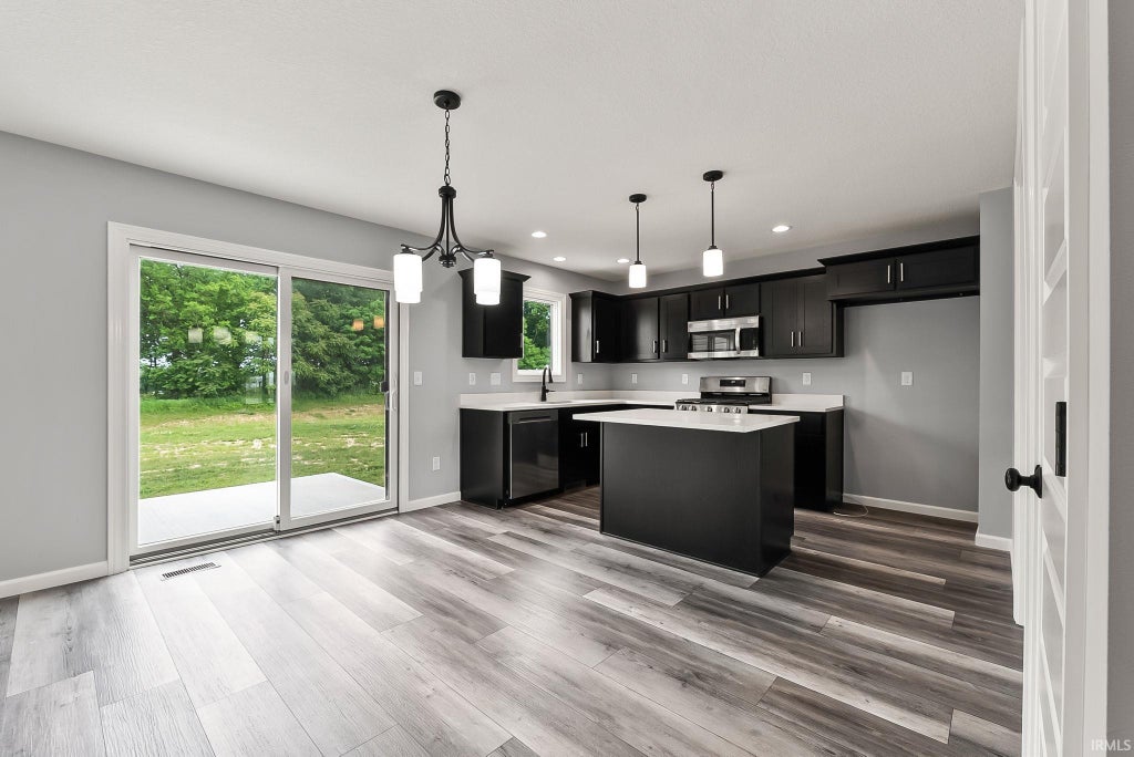 Photo of 110 Longrifle Road, Warsaw, IN 46580 (MLS # 202622376)