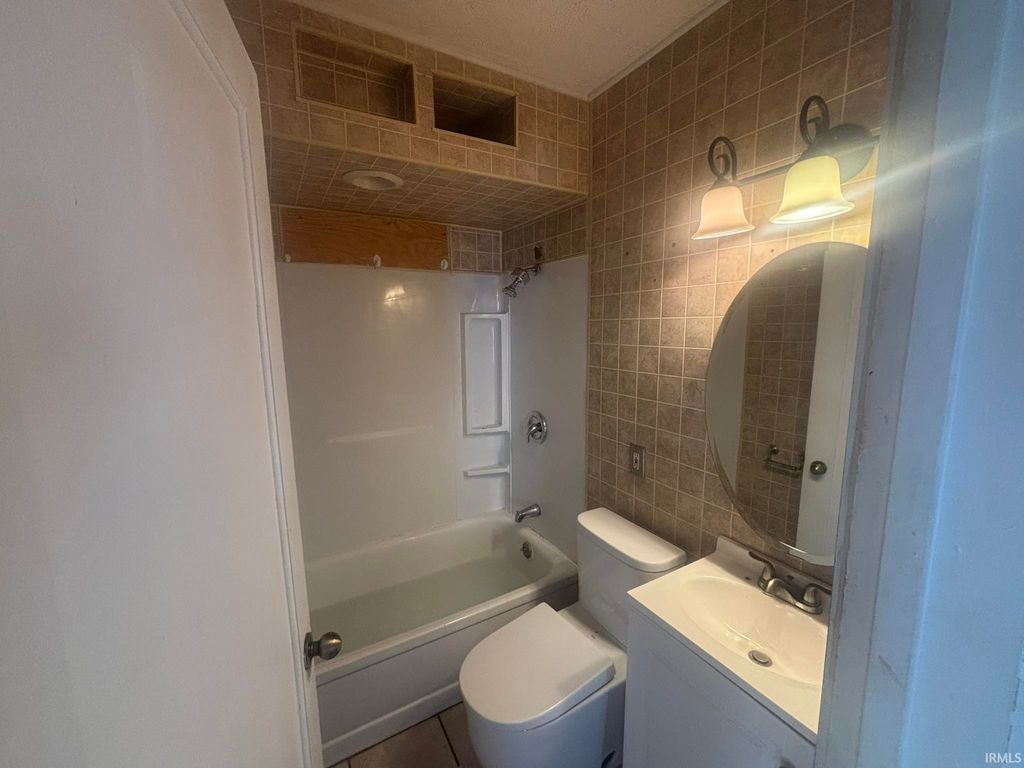 Photo of 1028 Covert Avenue, Evansville, IN 47713 (MLS # 202620100)
