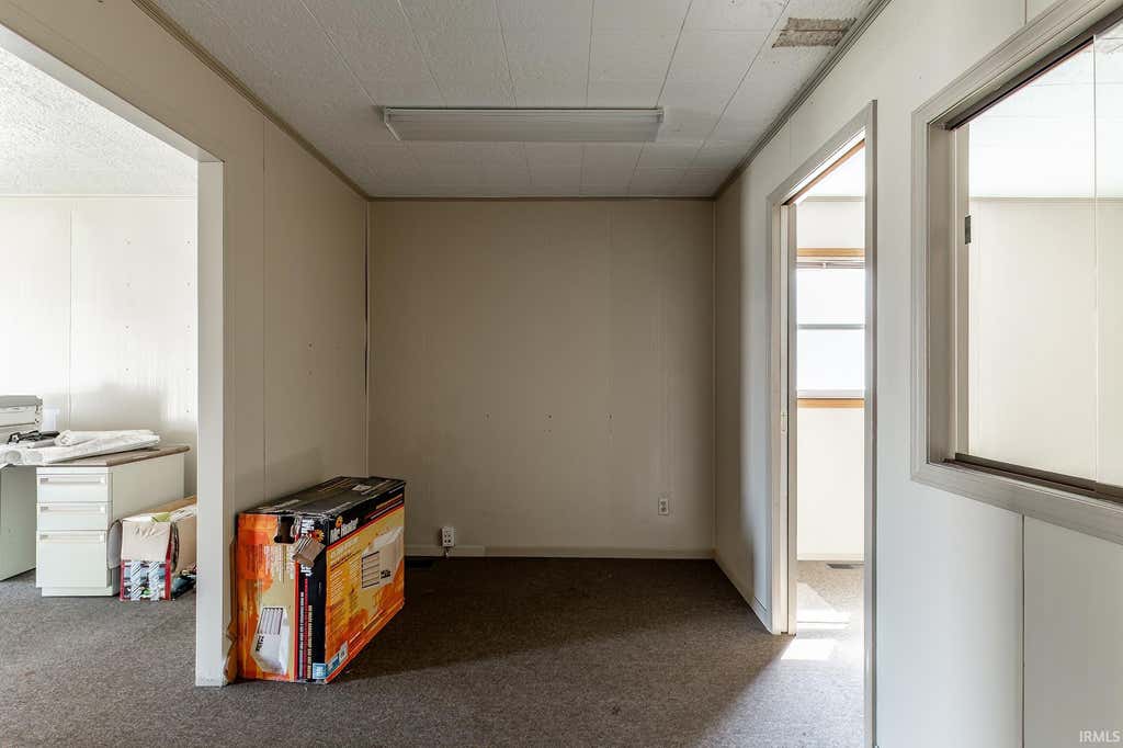 Photo of 305/307 E Ninth East Street, Auburn, IN 46706 (MLS # 202634922)