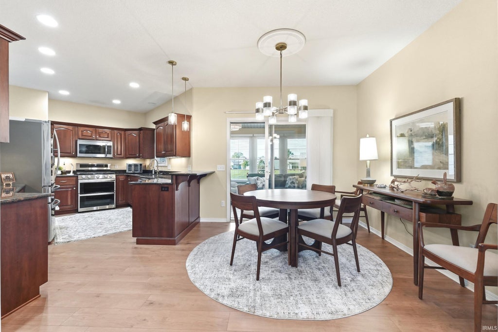 Photo of 9513 Courtyard Cove, Fort Wayne, IN 46825 (MLS # 202644070)