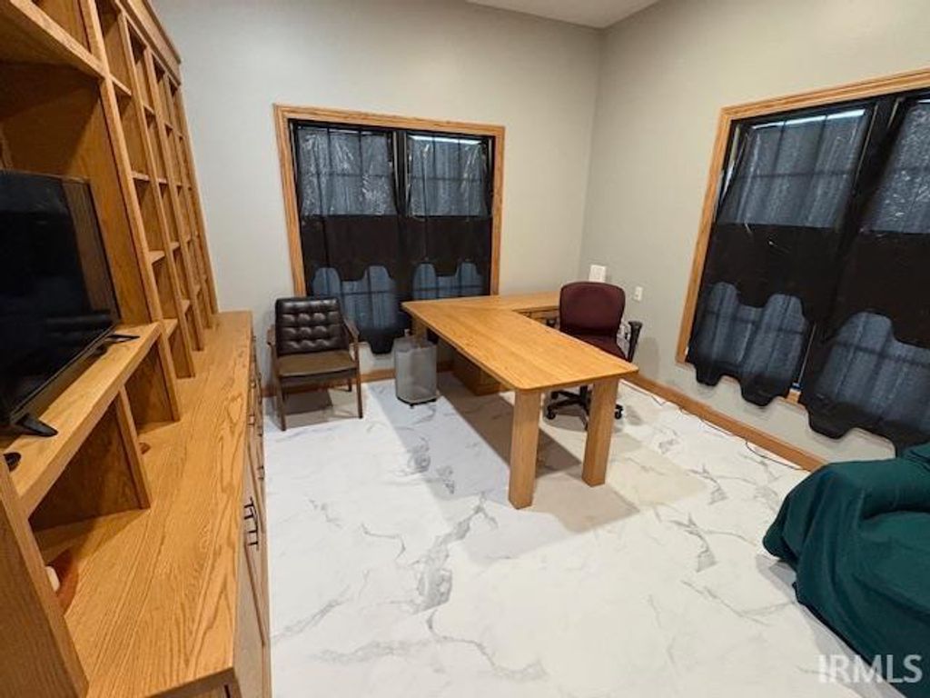 Photo of 203 NE 1st. Street, Loogootee, IN 47553 (MLS # 202608328)