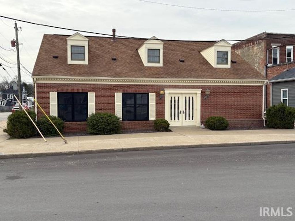 Photo of 203 NE 1st. Street, Loogootee, IN 47553 (MLS # 202608328)