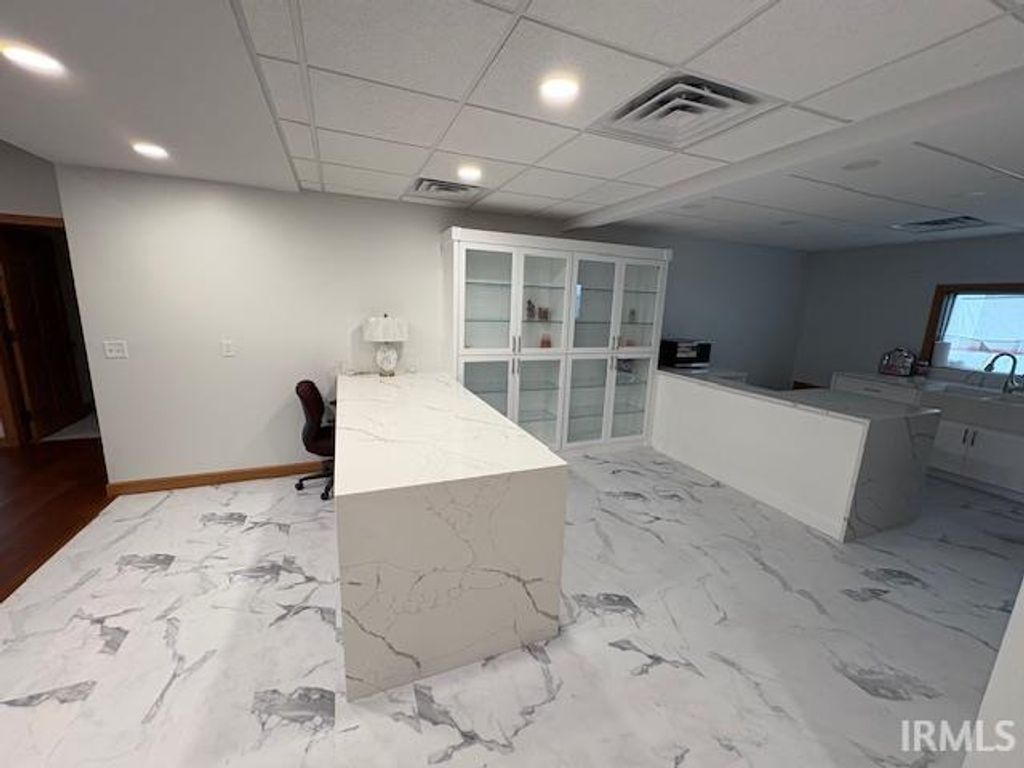 Photo of 203 NE 1st. Street, Loogootee, IN 47553 (MLS # 202608328)