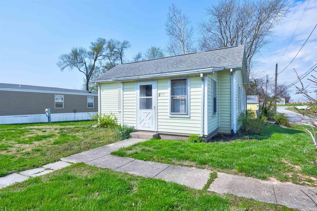 Photo of 602 S Main Street, Owensville, IN 47665 (MLS # 202610839)