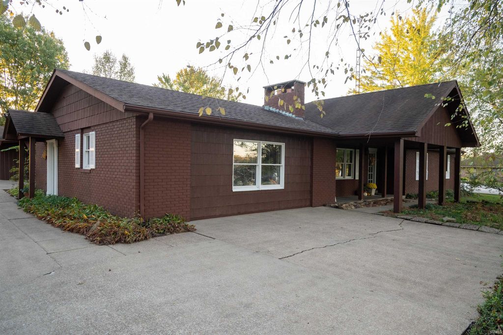 Photo of 276 S Poinsettia Drive, Santa Claus, IN 47579 (MLS # 202543257)