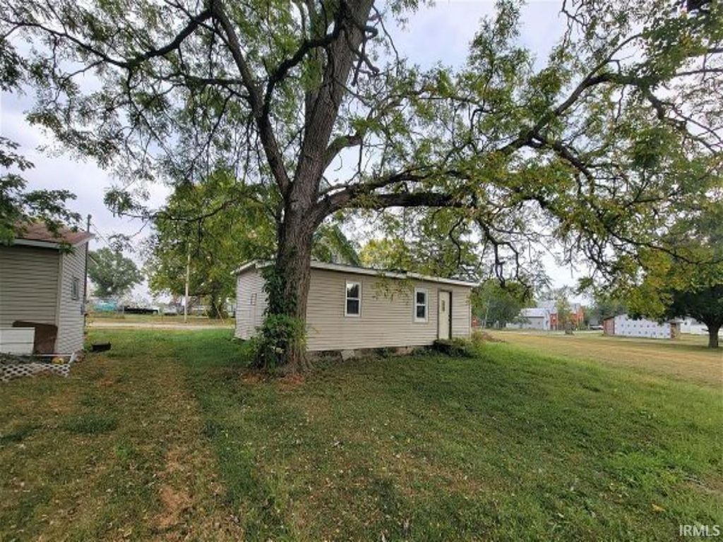 Photo of 105 N Sheridan Street, Ridgeville, IN 47380 (MLS # 202539758)
