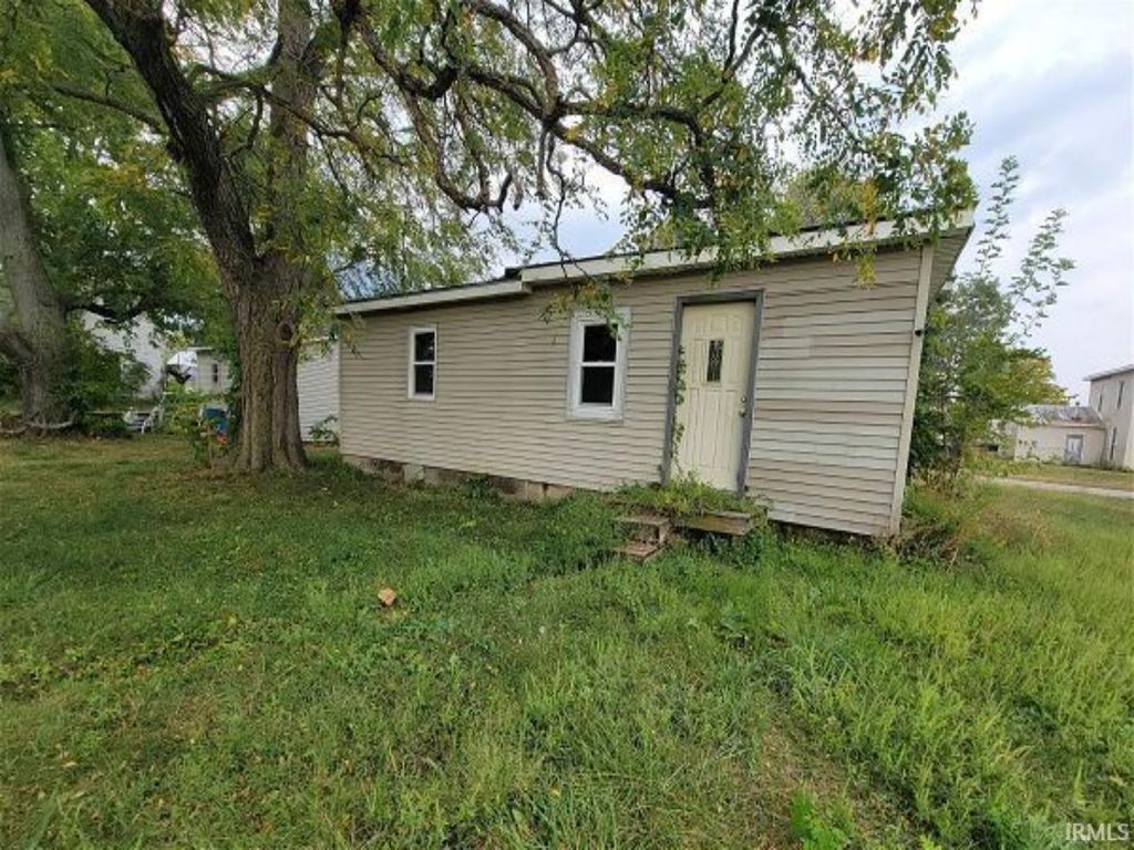 Photo of 105 N Sheridan Street, Ridgeville, IN 47380 (MLS # 202539758)