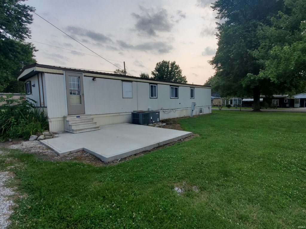 Photo of 128 S Kentucky Street, Jasonville, IN 47438 (MLS # 202626345)