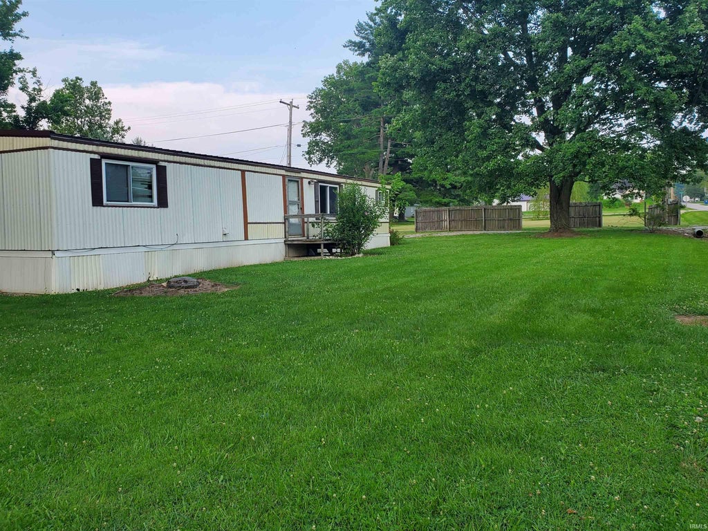 Photo of 128 S Kentucky Street, Jasonville, IN 47438 (MLS # 202626345)