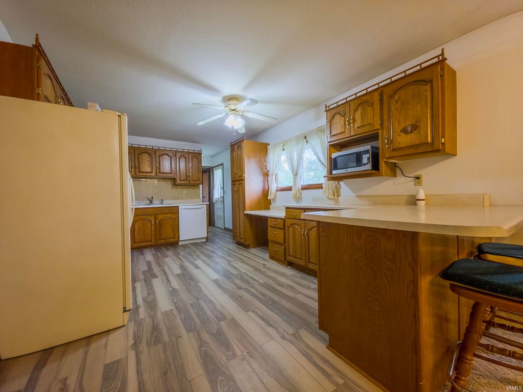 Photo of 411 Cherry Hill Drive, Mount Carmel, IL 62863 (MLS # 202611878)