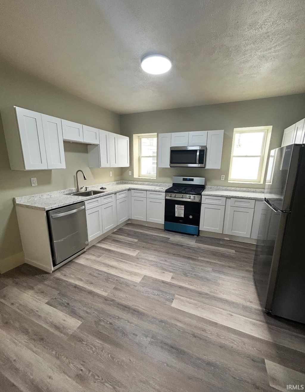 Photo of 403 Lincoln Way, South Bend, IN 46601 (MLS # 202548585)