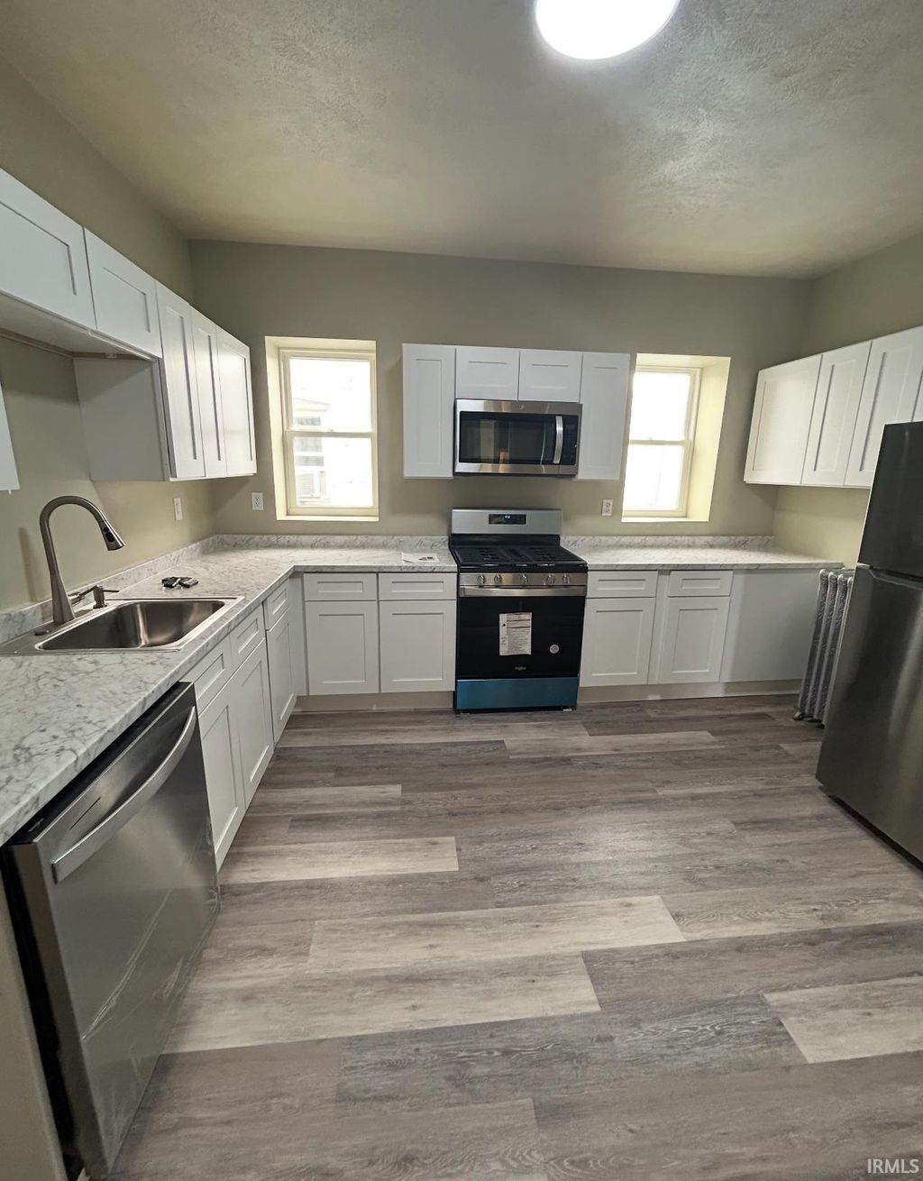 Photo of 403 Lincoln Way, South Bend, IN 46601 (MLS # 202548585)