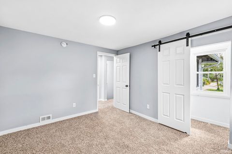 Tiny photo for 703 Portage Court, South Bend, IN 46616 (MLS # 202536103)