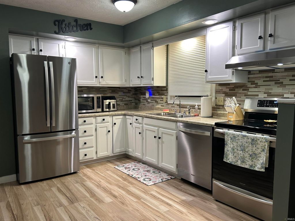 Photo of 5912 Lansdown Boulevard, South Bend, IN 46614 (MLS # 202549896)