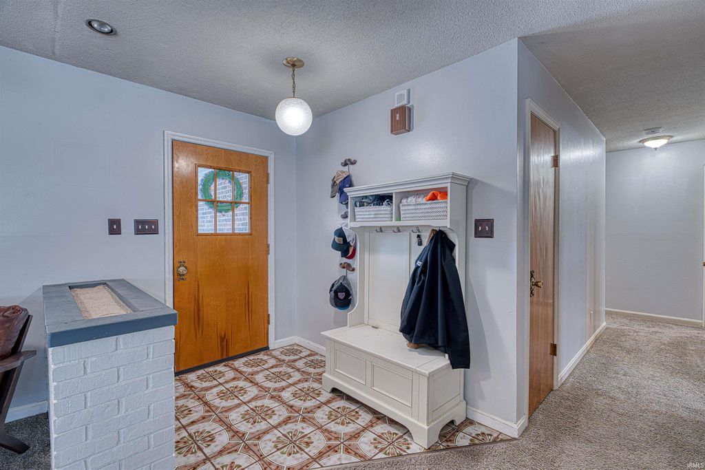 Photo of 301 Springhaven Drive, Evansville, IN 47710 (MLS # 202603739)