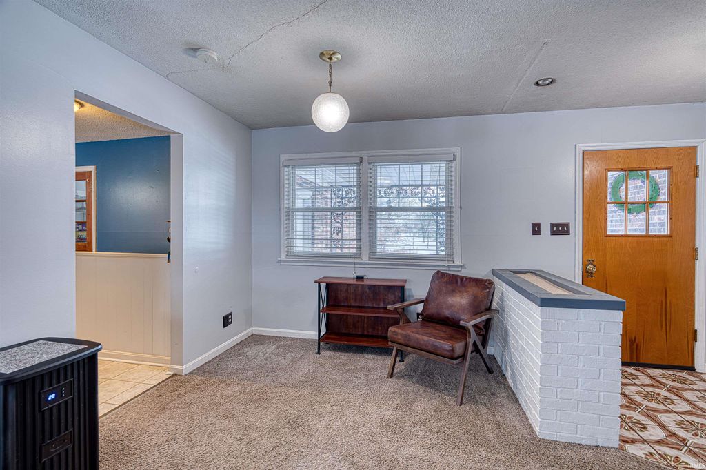 Photo of 301 Springhaven Drive, Evansville, IN 47710 (MLS # 202603739)