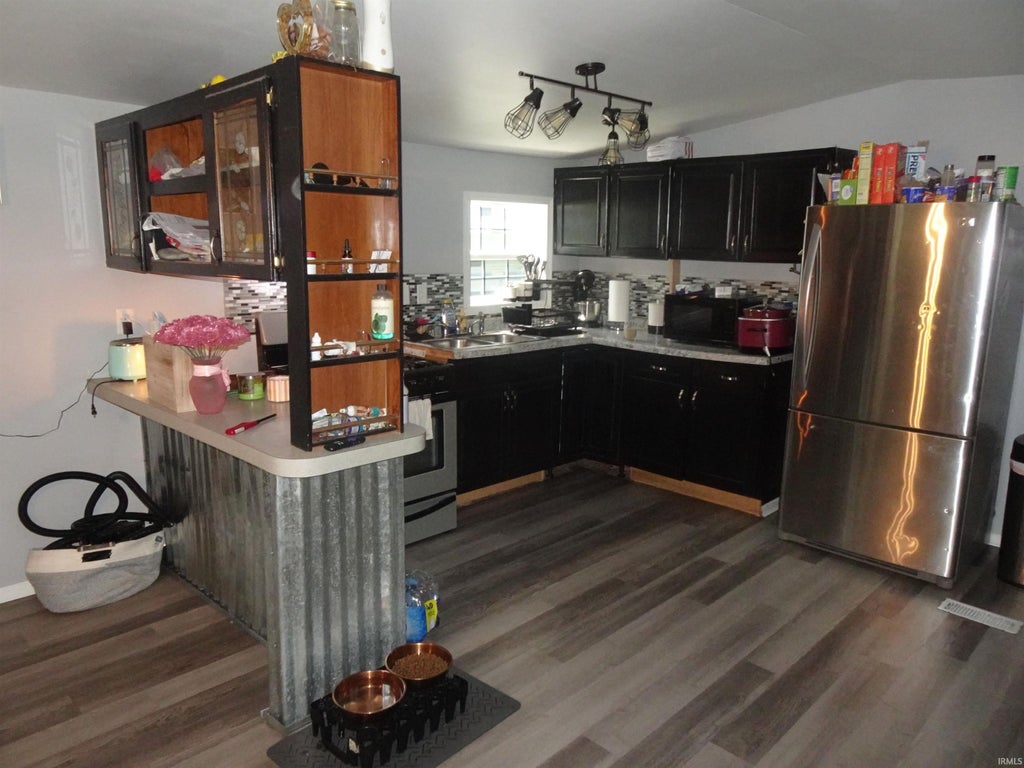 Photo of 8215 S U.S. 421, San Pierre, IN 46374 (MLS # 202635220)
