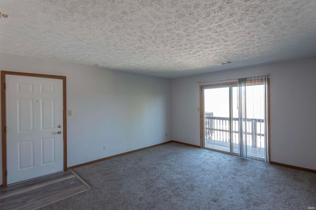 Photo of 3230 E John Hinkle Place #D11, Bloomington, IN 47408 (MLS # 202540814)