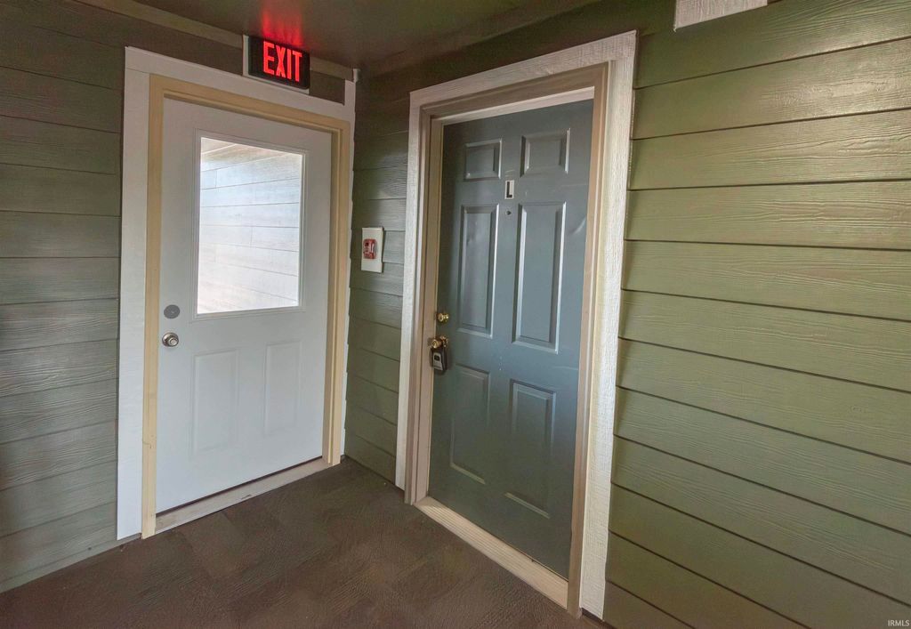 Photo of 3230 E John Hinkle Place #D11, Bloomington, IN 47408 (MLS # 202540814)