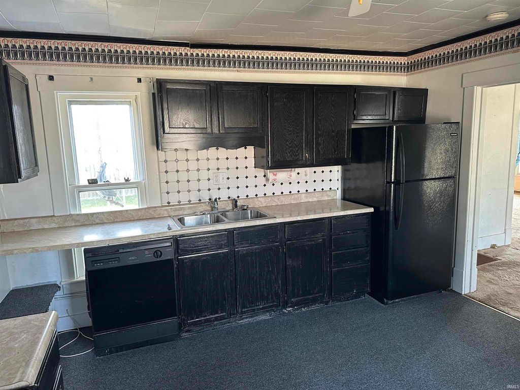 Photo of 604 Ohio Street, Walkerton, IN 46574 (MLS # 202607941)