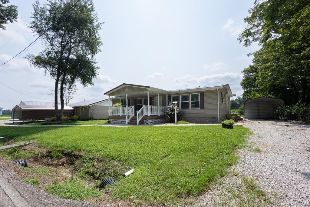 Photo of 7399 Main Street, Wadesville, IN 47638 (MLS # 202630909)