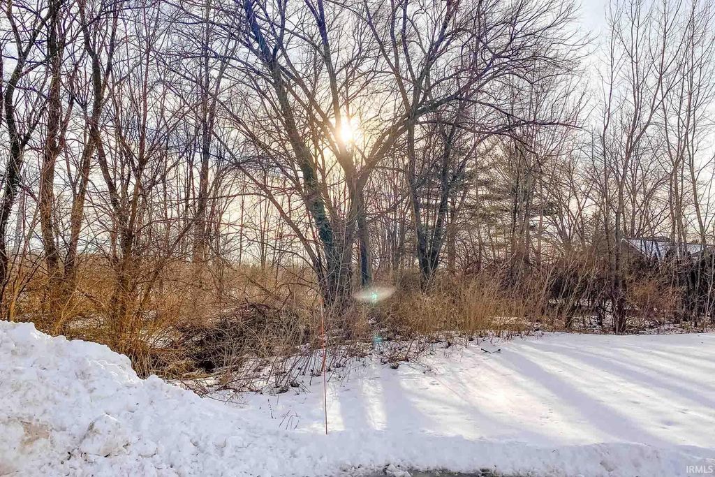 Photo of 53463 Old Woodbridge Court #6, South Bend, IN 46637 (MLS # 202602578)