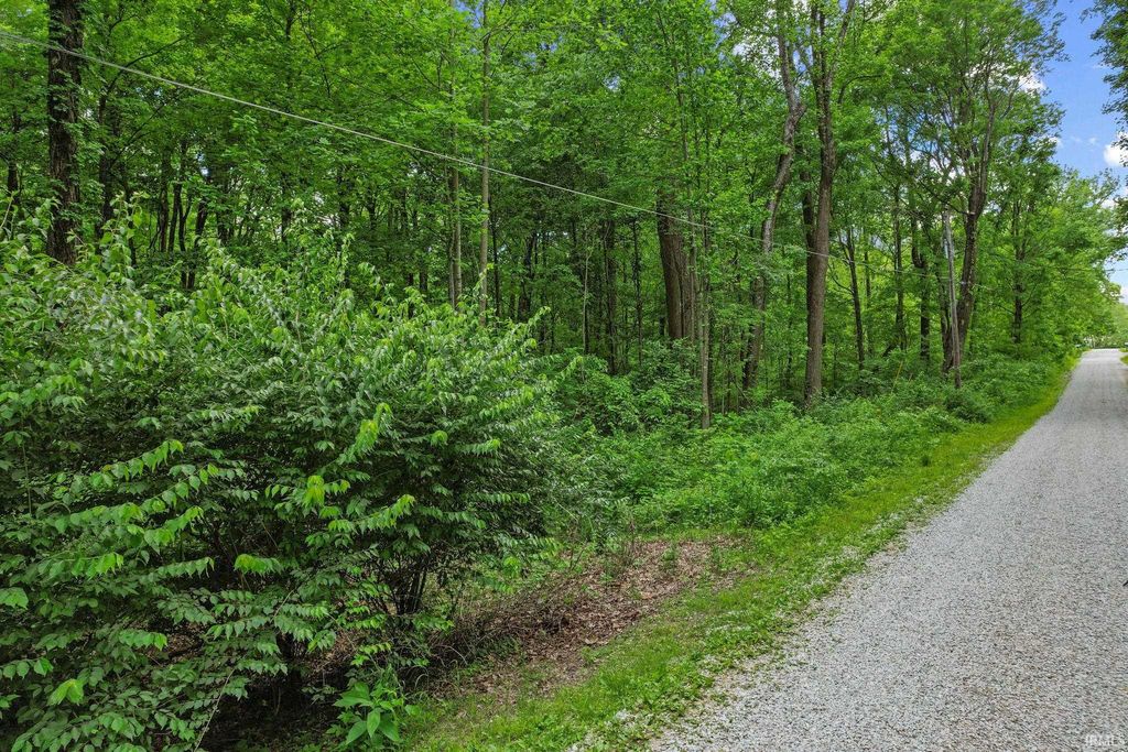 Photo of TBD Woodview Hills Lane, Solsberry, IN 47459 (MLS # 202618657)