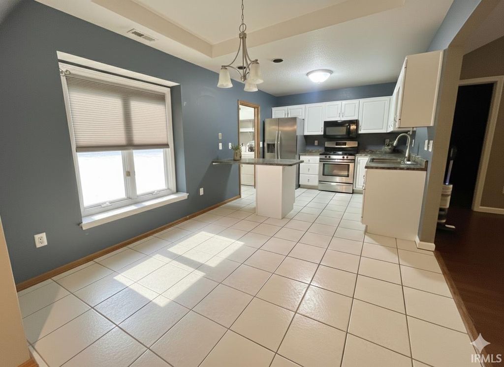 Photo of 621 Woodland Springs Place, Fort Wayne, IN 46825 (MLS # 202603771)