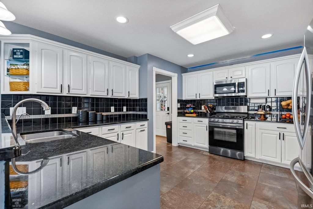 Photo of 5185 N Sawgrass Lane, Leesburg, IN 46538 (MLS # 202545930)