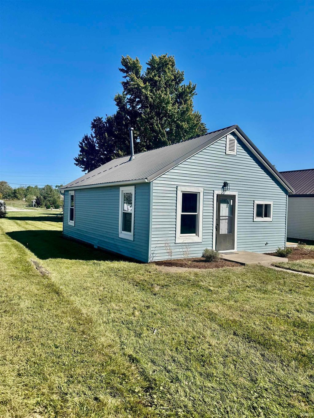 Photo of 816 W Chestnut Street, Hartford City, IN 47348 (MLS # 202539575)