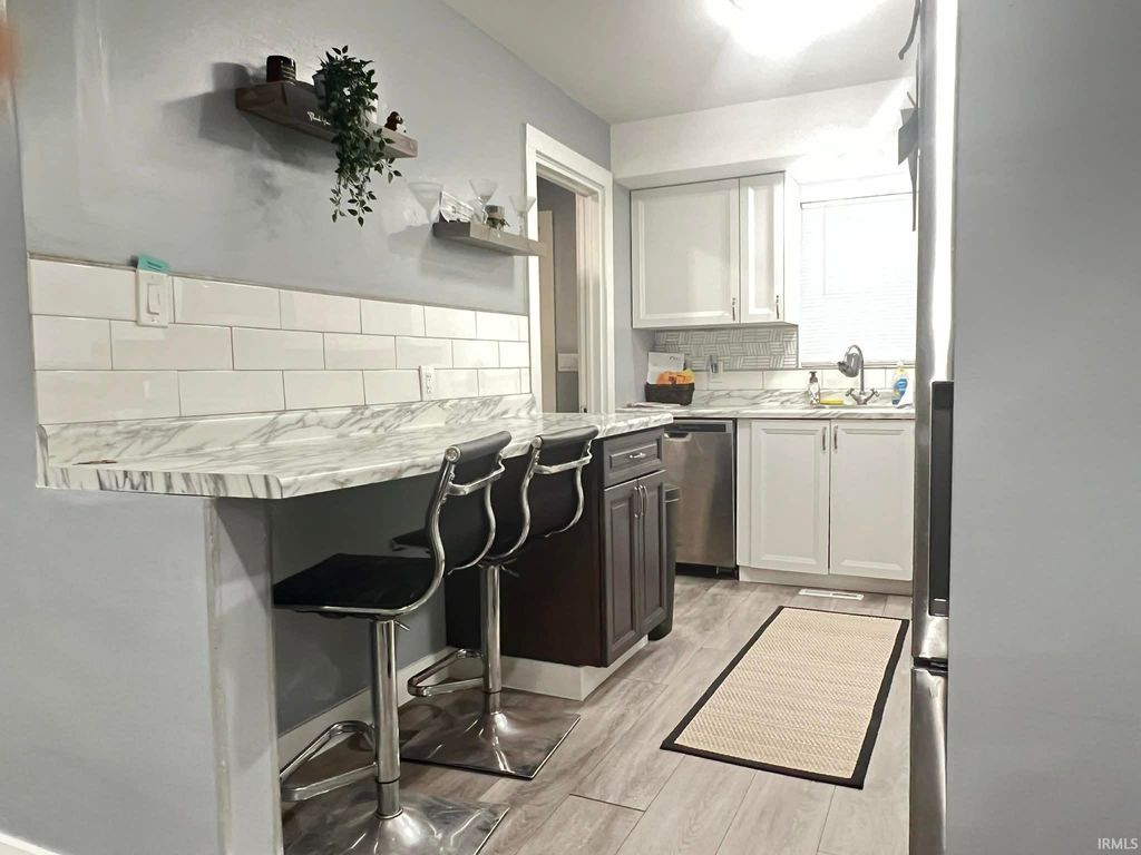 Photo of 1329 Fremont Street, South Bend, IN 46628 (MLS # 202610997)