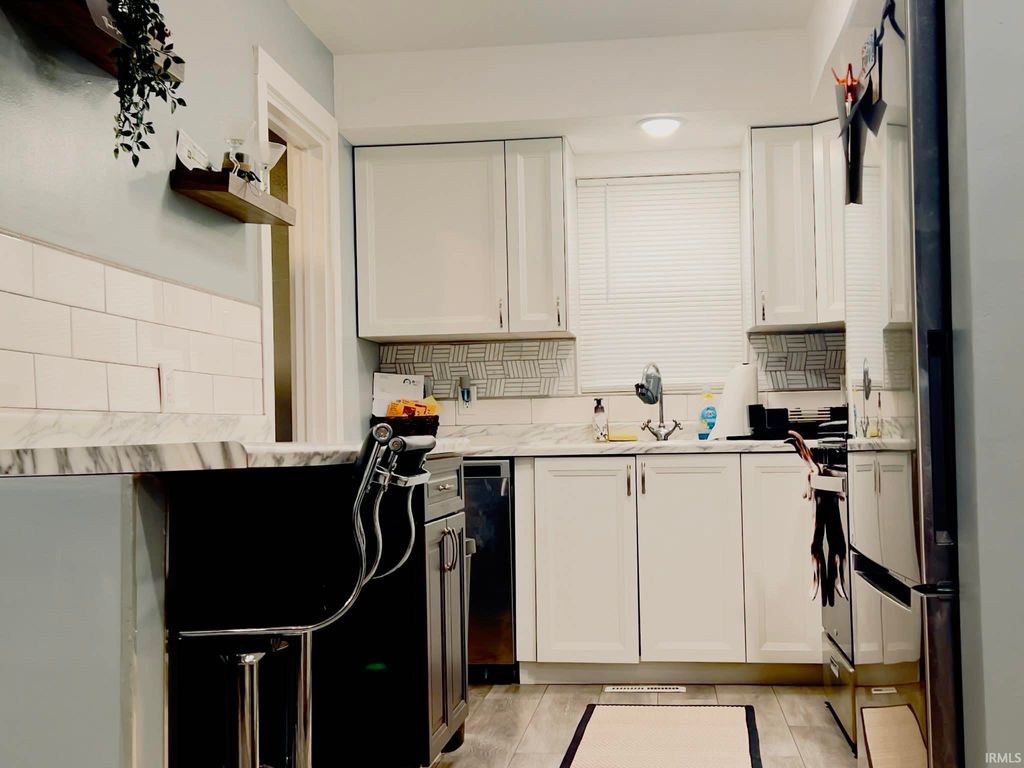 Photo of 1329 Fremont Street, South Bend, IN 46628 (MLS # 202610997)