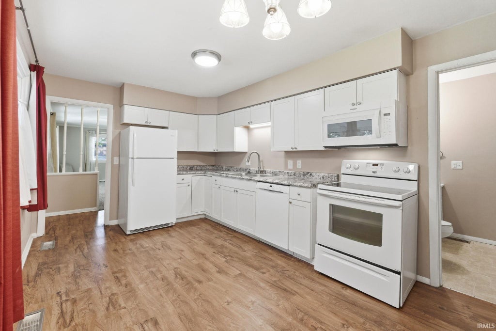Photo of 4111 Woodstock Drive, Fort Wayne, IN 46815 (MLS # 202628423)