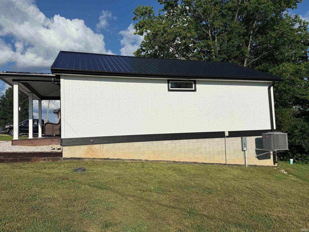 Photo of 323 Horton Ave AVE, Paoli, IN 47454 (MLS # 202628816)