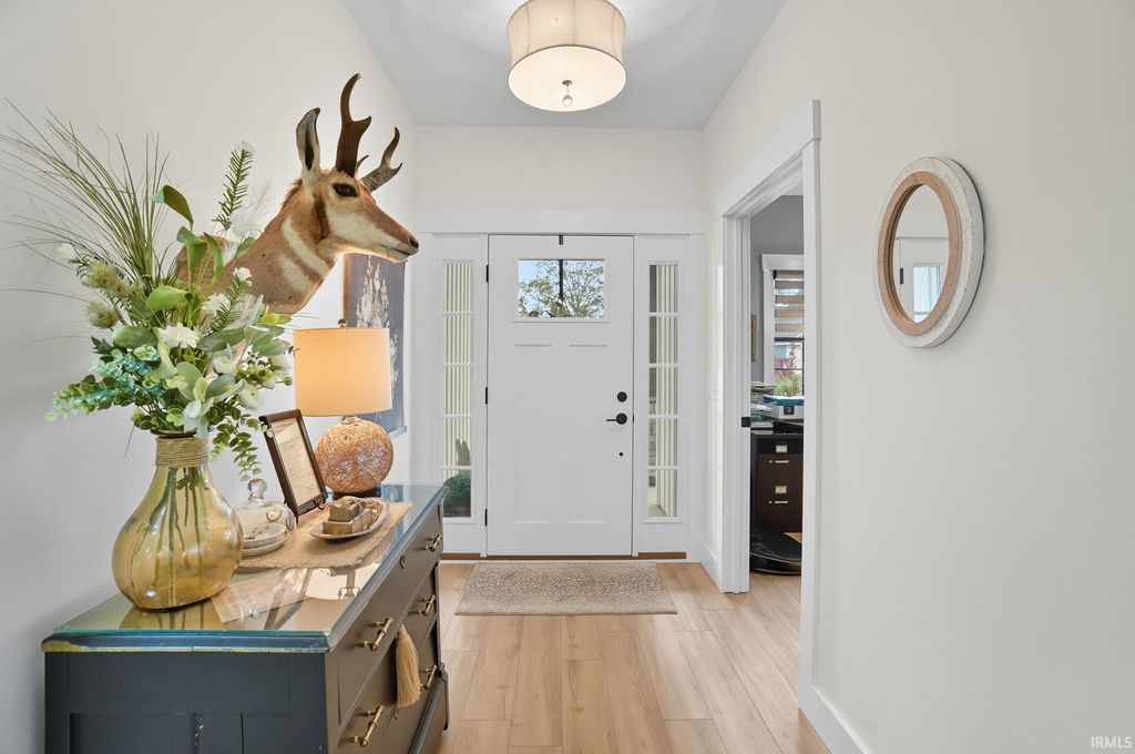 Photo of 1094 Midnight Chase Grove, Fort Wayne, IN 46845 (MLS # 202604765)