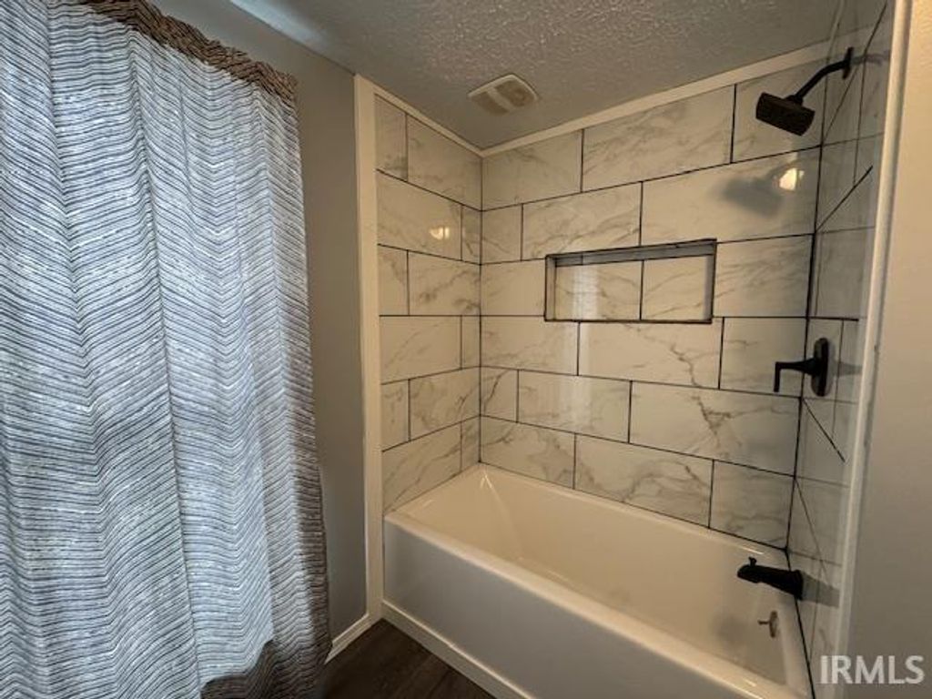 Photo of 215 S Albany Street St, Wolcottville, IN 46795 (MLS # 202548295)