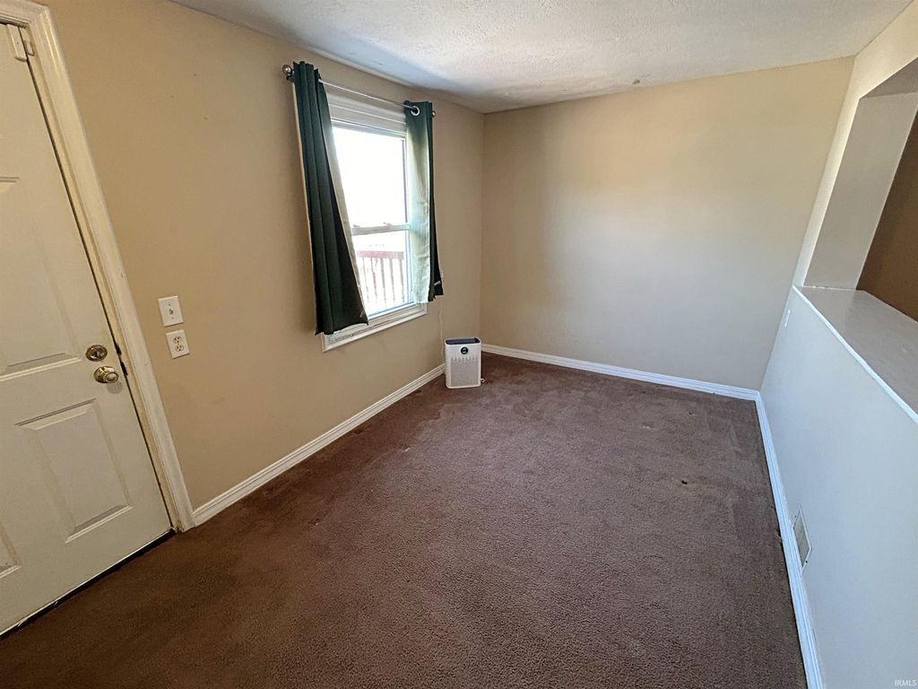 Photo of 332 N Cavins Street, Bloomfield, IN 47424 (MLS # 202606603)