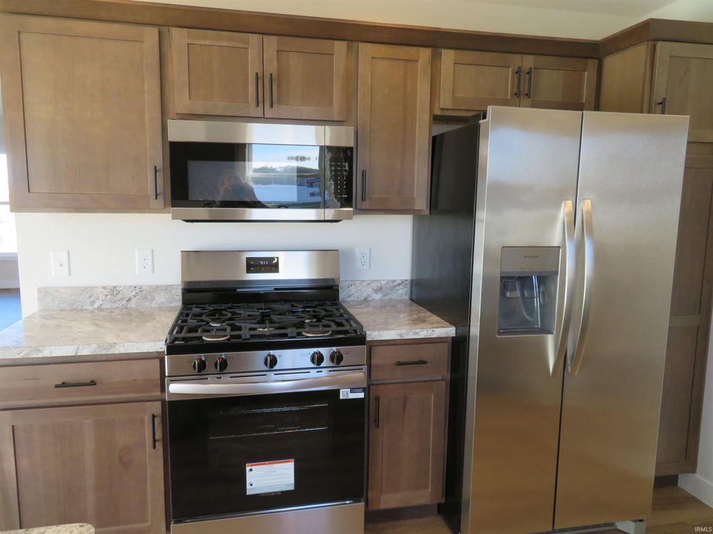 Photo of 68463 Falcons Lair Lane, New Paris, IN 46553 (MLS # 202543980)